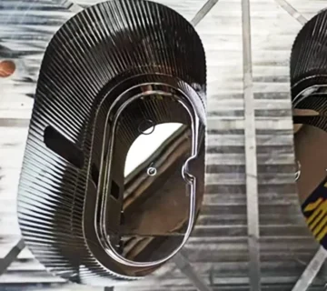 Technician performing injection mould polishing on a plastic mould surface